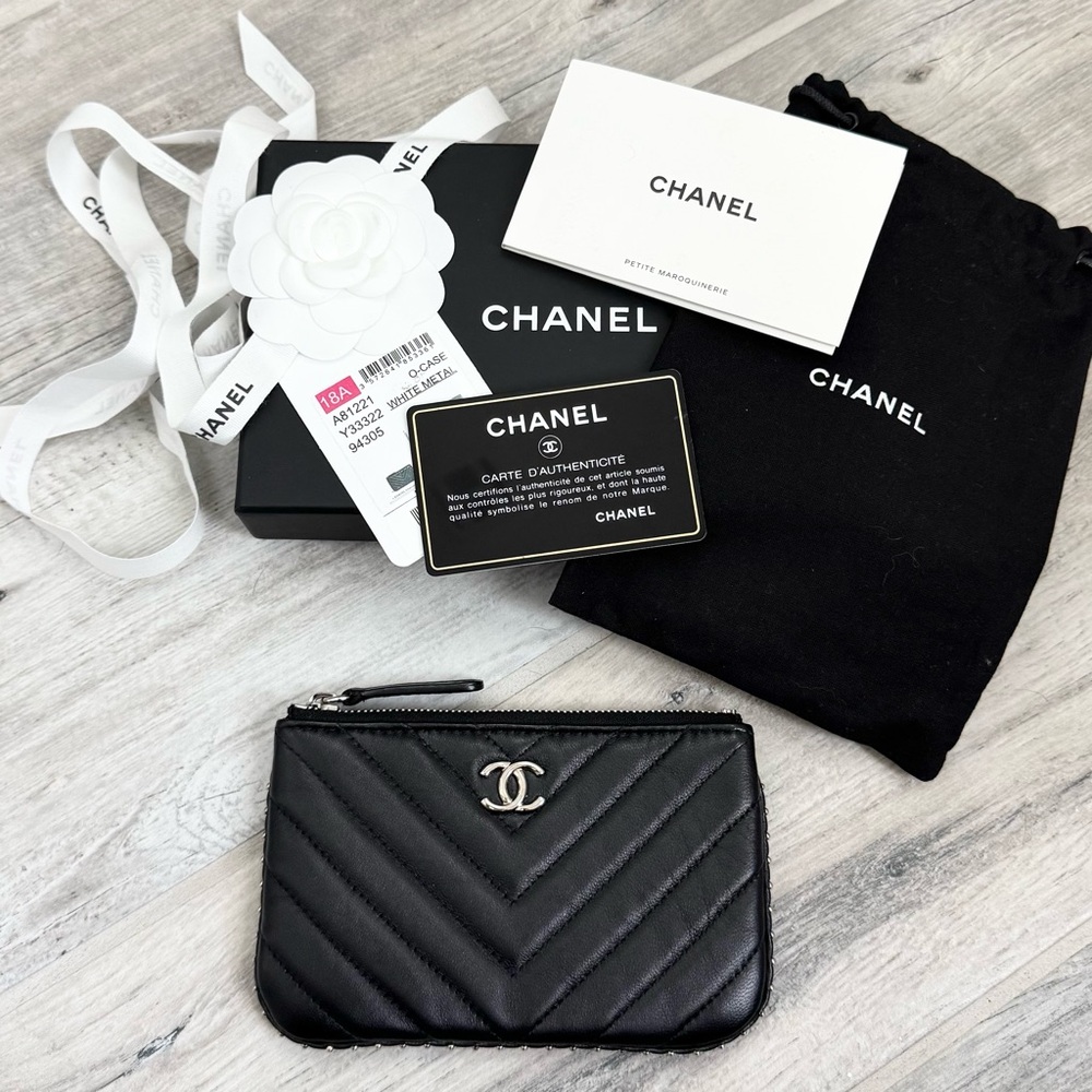Chanel Black Quilted Lambskin Leather Chevron Quilted Silver Studded Pouch